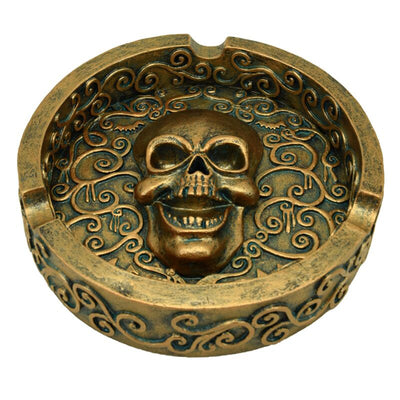 Cenicero de calavera de efecto de oro metálico cepillado