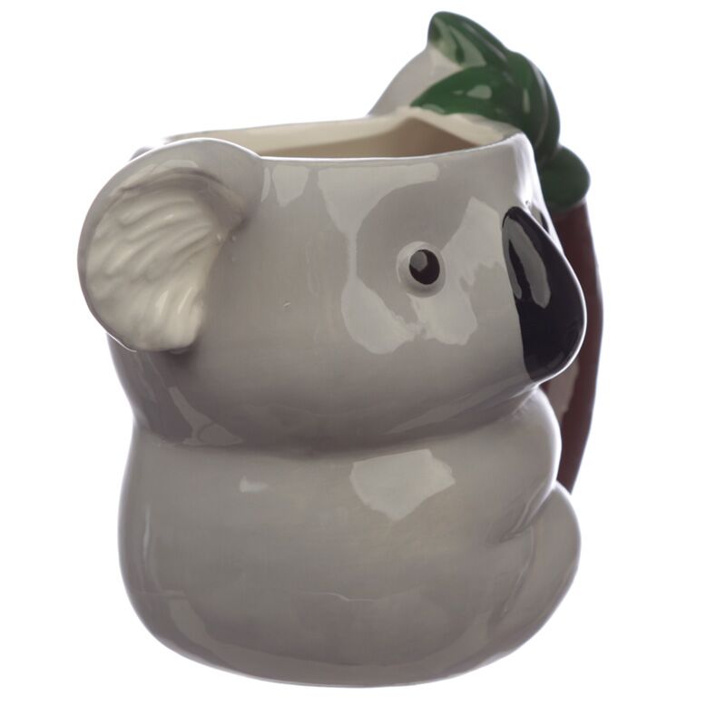 Taza de cerámica con forma de koala.