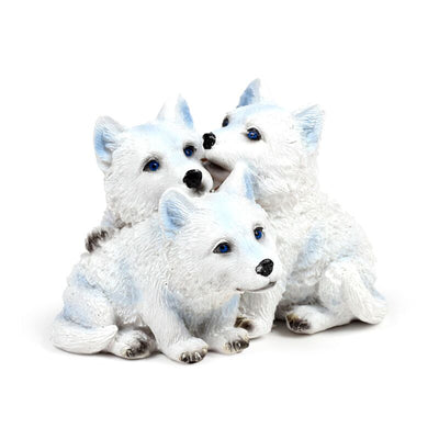 Trío de cachorros de lobo