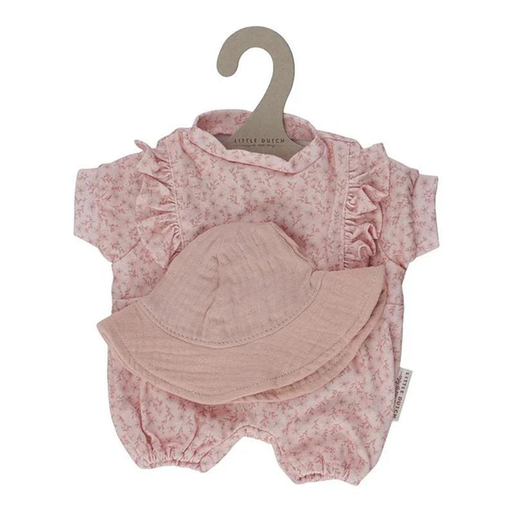 La piccola bambola olandese è vestita di rosa