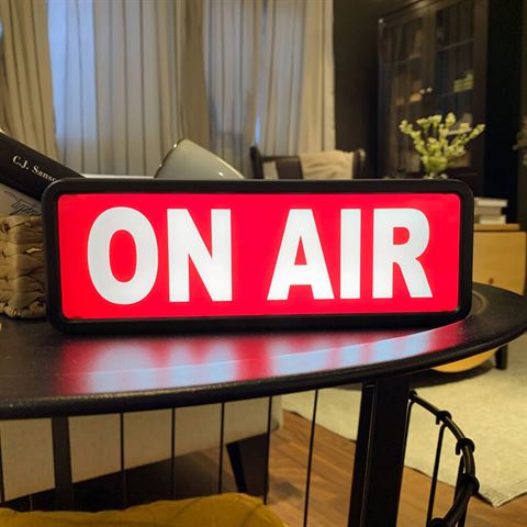 Orangemonkie en la iluminación de señal de aire