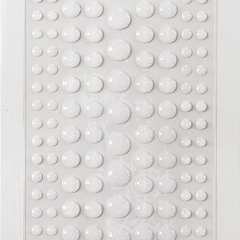 Design Marianne • Fiocchi di neve a pois smaltati